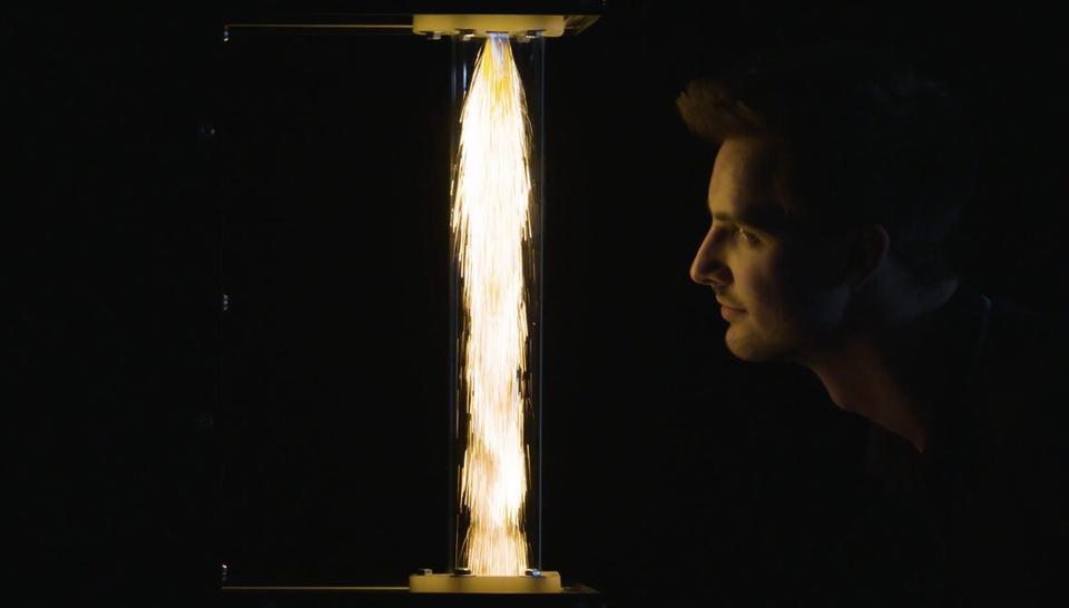 face looking at a flame