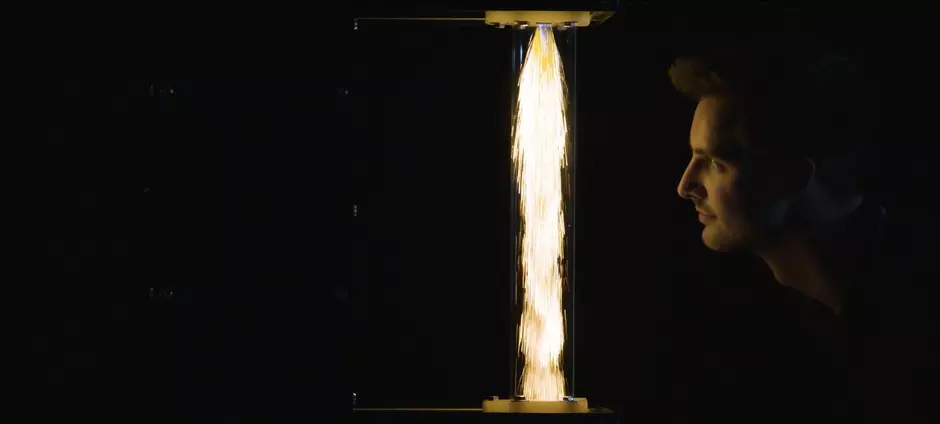 face looking at a flame