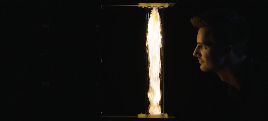 face looking at a flame